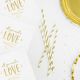 Serviettes blanches et or